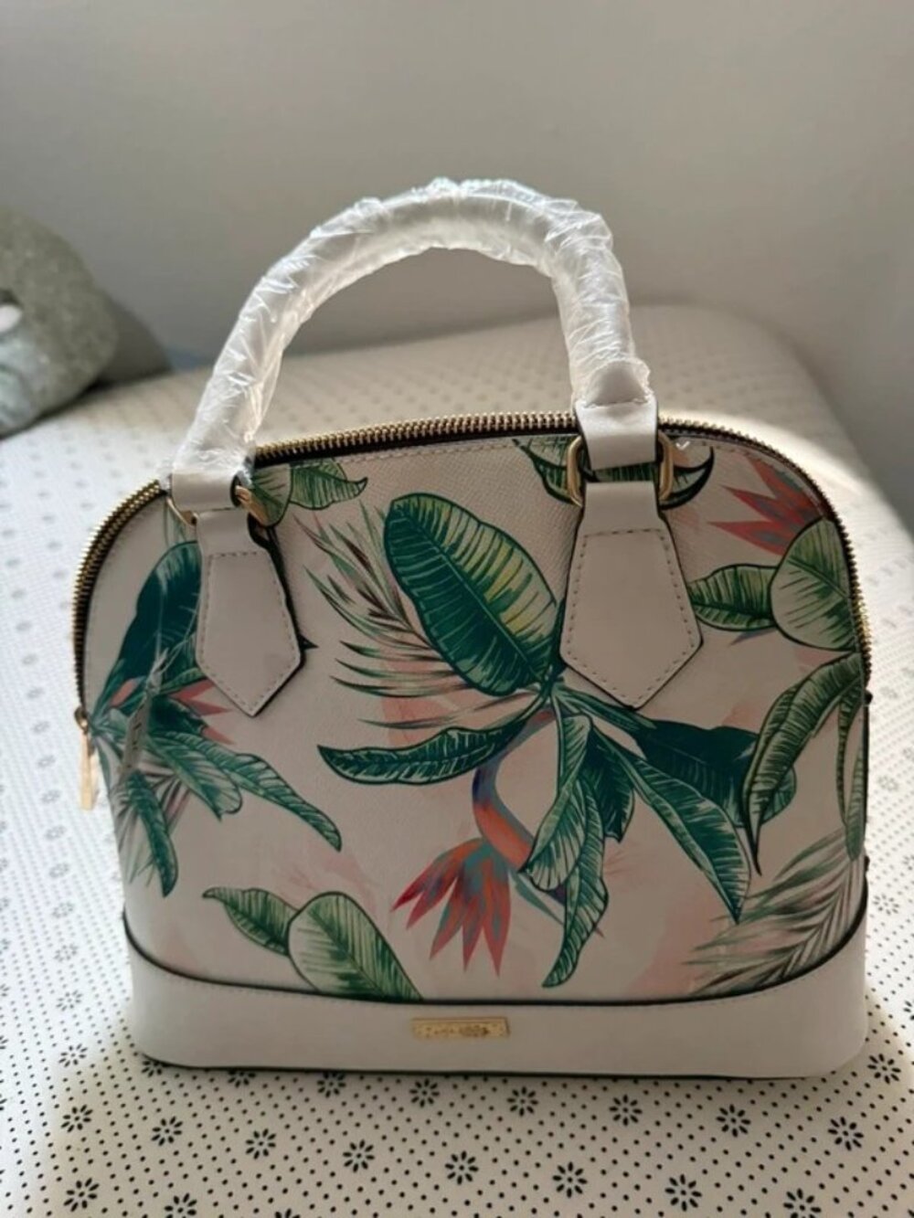Aldo Dome White Crossbody Bag with Green Leaf Print